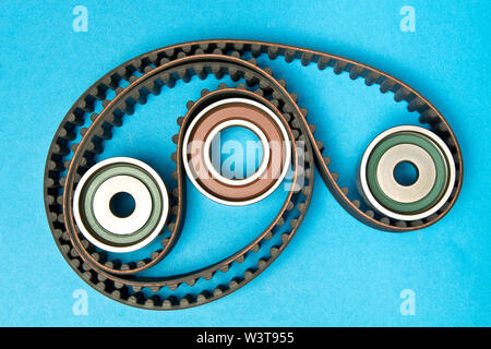 Timing belt with rollers on background .Kit of timing belt for car engine Stock Photo