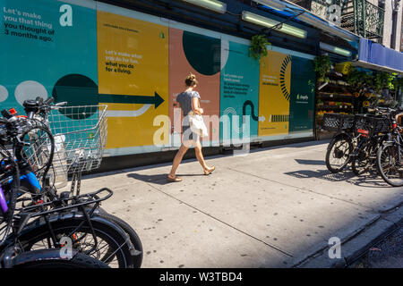 Advertising for the e-commerce enabling company Shopify in the Lower East Side neighborhood of New York on Saturday, July 13, 2019. (© Richard B. Levine) Stock Photo