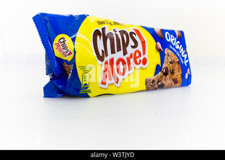 An isolated packet of original blue flavour of Chips more, a chocolate chip cookies, isolated in white background. Stock Photo