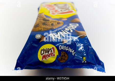 An isolated packet of original blue flavour of Chips more, a chocolate chip cookies, isolated in white background. Stock Photo