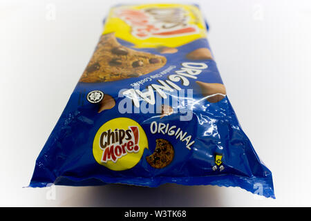 An isolated packet of original blue flavour of Chips more, a chocolate chip cookies, isolated in white background. Stock Photo