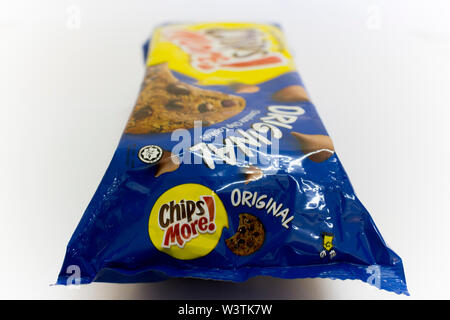 An isolated packet of original blue flavour of Chips more, a chocolate chip cookies, isolated in white background. Stock Photo