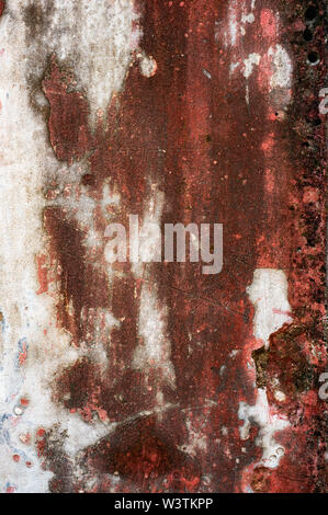 Original background of natural cement plaster on red textured wall with cracks. Stock Photo