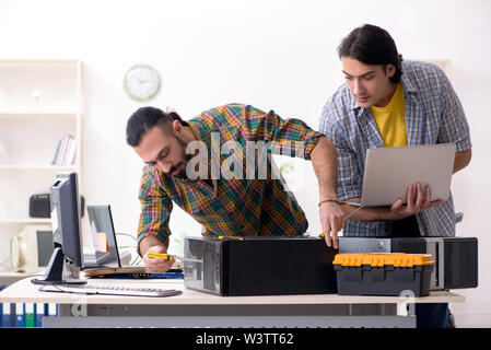 The it engineers working on hardware issue Stock Photo