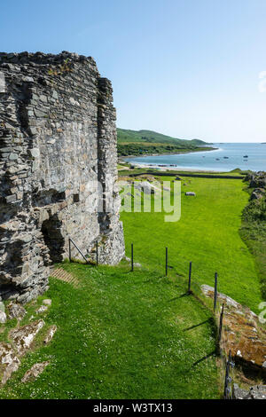 Ruins of Castle Sween, one of the earliest stone castles built in Scotland, on eastern shore of Loch Sween in Argyle and Bute, Scotland, UK Stock Photo