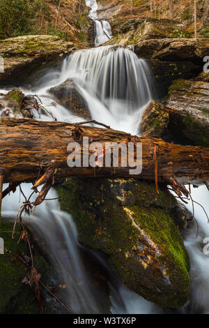 Tom's Creek Falls, North Carolina, USA. The 60-foot falls are located on Tom's Creek, near Marion, NC. The creek flows over several cascading upper se Stock Photo