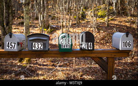 Numbered mailboxes, in a rural area near Bakersville, Mitchell County, North Carolina, USA. Stock Photo