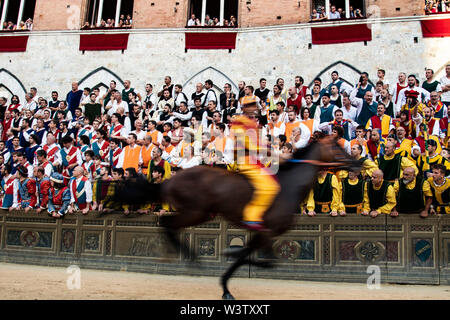 Horse race and crowd a the historic Palio in Siena, Italy Stock Photo