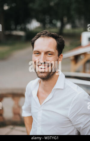 positive bearded caucasian man laughing Stock Photo