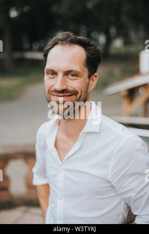 positive bearded caucasian man smiling Stock Photo