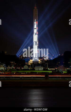 Saturn V rocket projected onto the Washington Monument during the Smithsonian celebration of the 50th Anniversary of the Apollo 11 moon landing in DC. Stock Photo