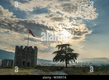 Silhouetted before the sunset.The fortress,known as Kale, is located in Centar municipality and situated on the highest point in the city overlooking Stock Photo