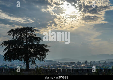 Silhouetted before the sunset.The fortress,known as Kale, is located in Centar municipality and situated on the highest point in the city overlooking Stock Photo