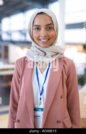 Smiling businesswoman in hijab Stock Photo
