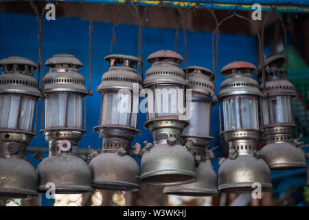 dusty fuel lamps hanging at an outdoor cafe in Hua Hin / Thailand Stock Photo