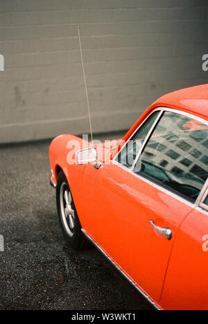 Sports luxury vintage car parked by the wall Stock Photo