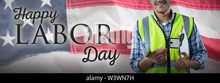 Composite image of happy construction worker Stock Photo
