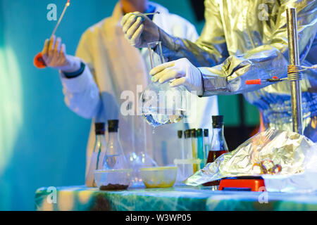 Experiments in a chemistry lab. conducting an experiment in the laboratory Stock Photo