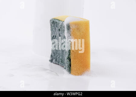 Old Sponge Wash,Absorbent Yellow Sponges cleaning Isolated on white background. Stock Photo