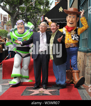 LOS ANGELES, CA. June 02, 2010: Composer Randy Newman (left) & Disney-Pixar boss  John Lasseter with Toy Story 3 stars Buzz Lightyear and Woody was honored today with a star on the Hollywood Walk of Fame. © 2010 Paul Smith / Featureflash