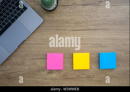 Office desktop Computer Laptop man  hands working on modern laptop computer top view Stock Photo