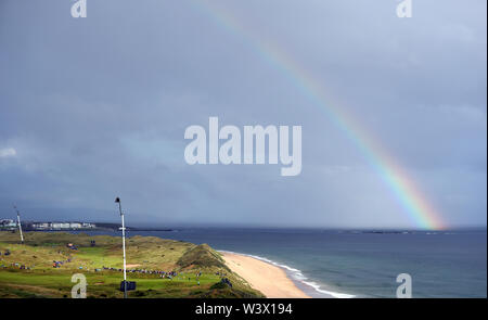 A rainbow appears over the course during day one of The Open Championship 2019 at Royal Portrush Golf Club. Stock Photo