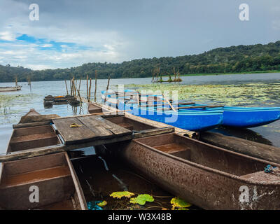 The traditional boats at Lake Tamblingan, Bali, Indonesia. Tamblingan is one the three lakes in Bedugul area Stock Photo