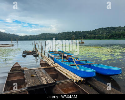 The traditional boats at Lake Tamblingan, Bali, Indonesia. Tamblingan is one the three lakes in Bedugul area Stock Photo