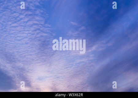 blue sky background with tiny clouds Stock Photo