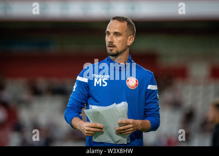 Welsh football coach Mark Sampson on the touchline during football match Stock Photo