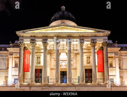 LONDON, UK - CIRCA DECEMBER 2012: The National Gallery in Trafalgar Square at night. It is an art museum and was founded in 1824. Stock Photo