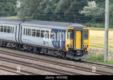 British Rail Class 156 Super Sprinter diesel multiple unit train pictured on the West Coast Main line at Winwick . Stock Photo