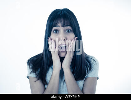 Close up of young woman feeling scared and shocked making fear, anxiety gestures. Looking terrified and desperate. People and Human expressions and em Stock Photo