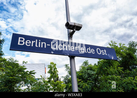 Berlin-Lichterfelde Ost railway station sign and CCTV security surveillance camera Stock Photo