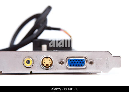 An old obsolete VGA / s-video output graphic card with archaic video outs isolated on white background. Low end pc gaming, old tech and pc components Stock Photo