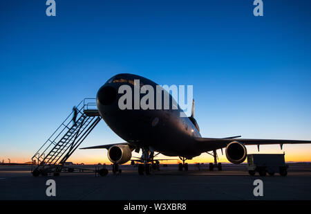 U.S. Airmen with the 6th Air Refueling Squadron prepare a KC-10 Extender before a mission to conduct a flyover for Maj. Brent Burklo’s funeral July 16, 2019, at Travis Air Force Base, California. Burklo was a KC-10 pilot at the 6th ARS who died July 10, 2019, after a two-year battle with cancer. (U.S. Air Force photo by Master Sgt. Joey Swafford) Stock Photo