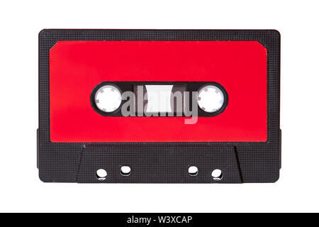 Blank red vintage cassette tape with an empty label isolated on white background, old retro audio equipment concept Stock Photo