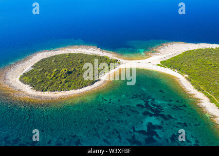 Aerial overhead shot of rocky seashore cape with crystal clear blue water on the island of Dugi Otok in Croatia Stock Photo