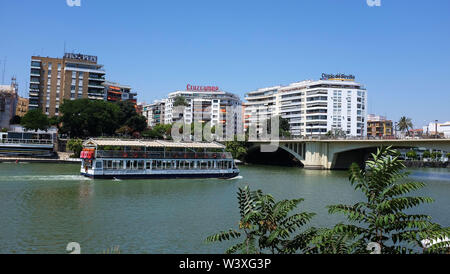 The Guadalquivir river running through Seville, Spain. Stock Photo