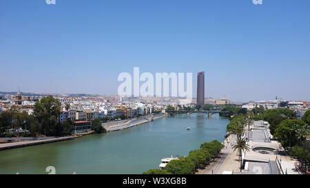 The Guadalquivir river running through Seville, Spain. Stock Photo