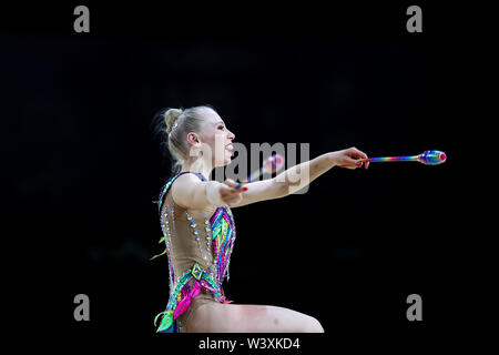 Kseniya Moustafaeva from France performs her clubs routine during 2019 Grand Prix de Thiais Stock Photo