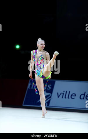 Kseniya Moustafaeva from France performs her clubs routine during 2019 Grand Prix de Thiais Stock Photo