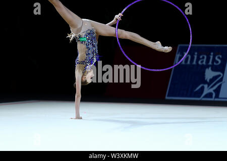 Anastasia Guzenkova from Russia performs her hoop routine during 2019 Grand Prix de Thiais Stock Photo