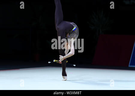 Viktoriie Onopriienko from Ukraine performs her clubs routine during 2019 Grand Prix de Thiais Stock Photo