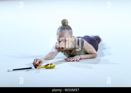 Viktoriie Onopriienko from Ukraine performs her clubs routine during 2019 Grand Prix de Thiais Stock Photo