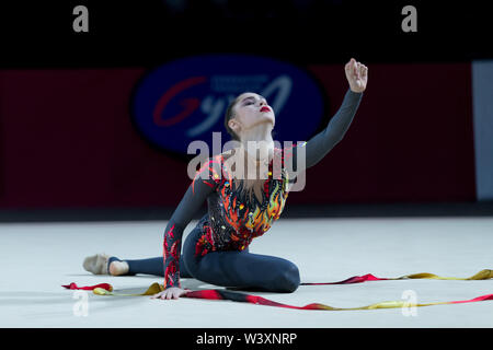 Vlada Nikolchenko from Ukraine performs her ribbon routine during 2019 Grand Prix de Thiais Stock Photo