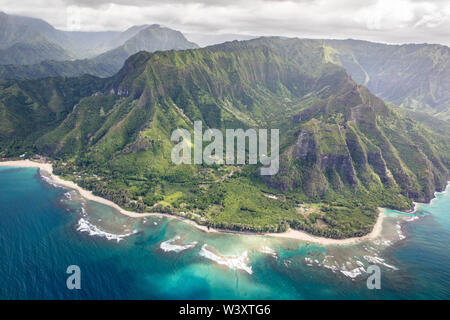 A helicopter tour is a breathtaking way to see the amazing aerial scenery of Kauai, Hawaii, USA including the famed Na Pali Coast Stock Photo