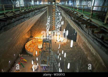 Salt mine Salina Turda with view to the Mina Rudolf and the amusement park, Turda, Cluj, Transylvania, Romania Stock Photo