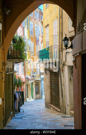 View down small alley in old quarter of Grasse, Alpes-Maritimes, Provence-Alpes-Cote d'Azur, France. Stock Photo