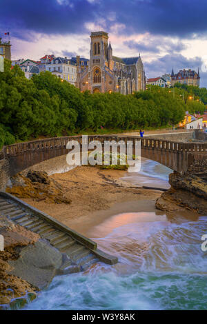 France, Aquitaine, Pyrenees Atlantiques, Biarritz, Saint Eugenia church at old port, dusk Stock Photo